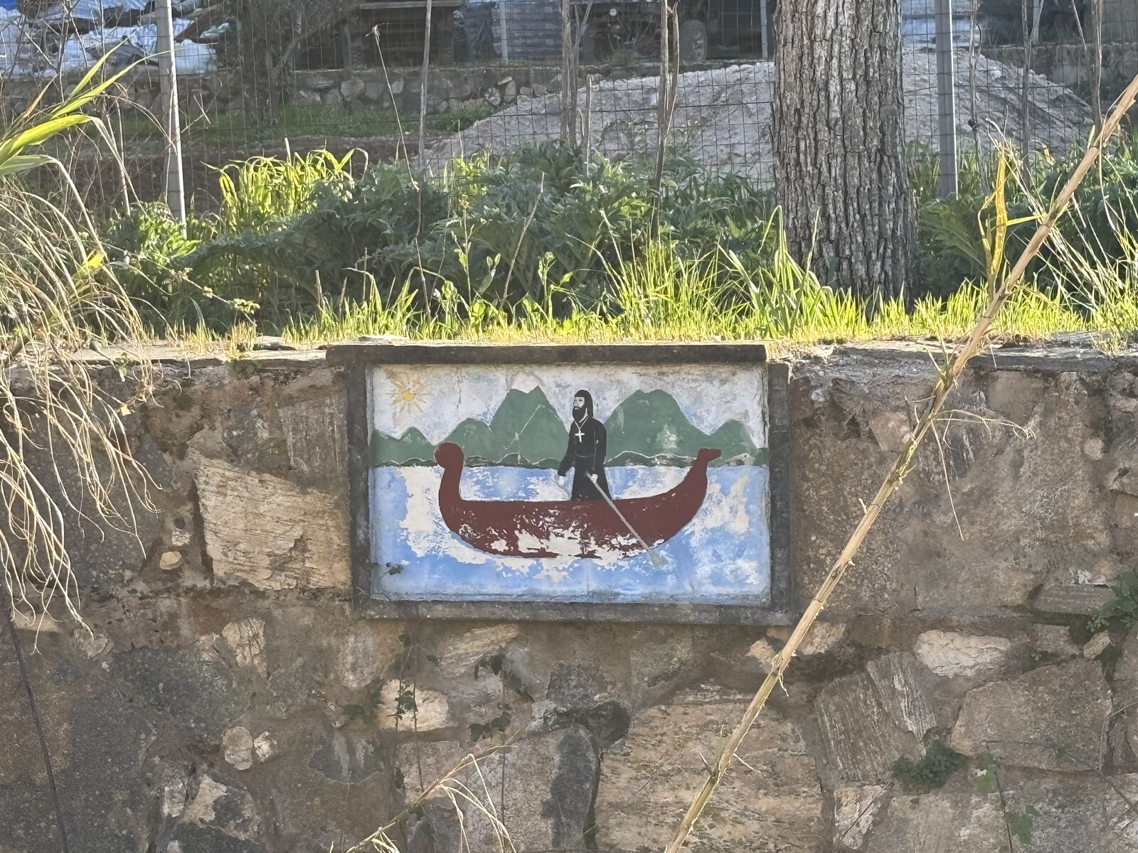 Wandmalerei eines Mönchs im Boot